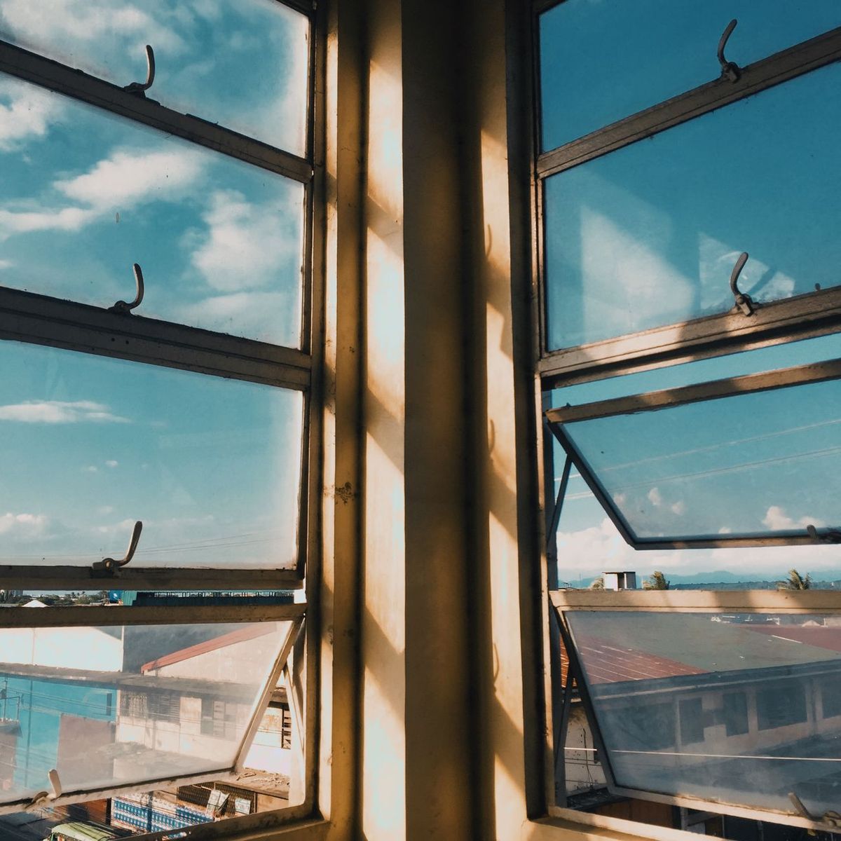 Aluminium window frames installed in a bright residential opening